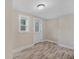 Bright dining area with wood-look floors and exterior access at 1256 Elizabeth Sw Ave, Atlanta, GA 30310