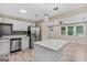 Modern kitchen with white cabinets, stainless steel appliances and island at 1256 Elizabeth Sw Ave, Atlanta, GA 30310