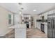 Modern kitchen with white cabinets, stainless steel appliances and island at 1256 Elizabeth Sw Ave, Atlanta, GA 30310