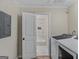 Convenient laundry room with washer, dryer, and access to a shower at 1256 Elizabeth Sw Ave, Atlanta, GA 30310