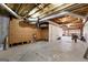 Unfinished basement with exposed pipes and ample storage space at 120 Greenfield Cir, Fayetteville, GA 30215