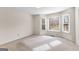 Bright bedroom with bay window and neutral wall colors at 120 Greenfield Cir, Fayetteville, GA 30215