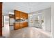 Kitchen with peninsula counter and ample wood cabinetry at 120 Greenfield Cir, Fayetteville, GA 30215