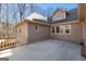 Large concrete patio area with surrounding trees at 120 Greenfield Cir, Fayetteville, GA 30215