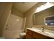 Clean bathroom with a shower/tub combo and updated vanity at 4879 Pinnacle Dr, Stone Mountain, GA 30088