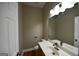 Bathroom with vanity, toilet and hardwood floor at 4879 Pinnacle Dr, Stone Mountain, GA 30088