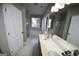 Bathroom features a double vanity and soaking tub at 4879 Pinnacle Dr, Stone Mountain, GA 30088