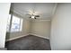 Spacious bedroom with wall-to-wall carpet and large window at 4879 Pinnacle Dr, Stone Mountain, GA 30088