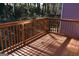 Wooden deck overlooks a wooded area at 4879 Pinnacle Dr, Stone Mountain, GA 30088