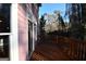 View of a wooden deck and backyard at 4879 Pinnacle Dr, Stone Mountain, GA 30088