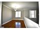 Bright dining room with hardwood floors and large windows at 4879 Pinnacle Dr, Stone Mountain, GA 30088