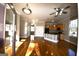 Open kitchen with an island and hardwood floors at 4879 Pinnacle Dr, Stone Mountain, GA 30088