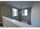 High ceiling living room with large windows at 4879 Pinnacle Dr, Stone Mountain, GA 30088