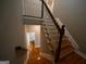 Hardwood staircase with white railings at 4879 Pinnacle Dr, Stone Mountain, GA 30088