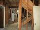 Unfinished basement with exposed beams and subflooring. Requires renovation at 3816 King Henry Sw Rd, Atlanta, GA 30331
