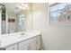 Simple bathroom with single vanity and window at 718 Grove Pointe Cir, Locust Grove, GA 30248