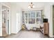 Bright breakfast nook with window and access to backyard at 718 Grove Pointe Cir, Locust Grove, GA 30248