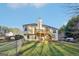 Two-story house with deck and fenced backyard at 718 Grove Pointe Cir, Locust Grove, GA 30248