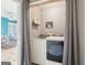 Convenient laundry room with washer and dryer at 718 Grove Pointe Cir, Locust Grove, GA 30248