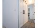 Hallway with barn doors and carpeted floors at 95 Pin Oak Trl, Villa Rica, GA 30180