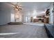 Open concept living room with kitchen, fireplace, and high ceilings at 95 Pin Oak Trl, Villa Rica, GA 30180