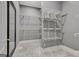 Large walk-in closet with ample shelving and hanging space at 145 Havenbrooke Ct, Fayetteville, GA 30214