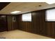 Finished basement with neutral walls and tile flooring at 2405 Falls River Dr, Lithia Springs, GA 30122