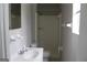 Clean bathroom featuring a shower, toilet, and vanity at 2405 Falls River Dr, Lithia Springs, GA 30122