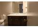 Bathroom with vanity and large mirror at 2405 Falls River Dr, Lithia Springs, GA 30122