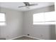 Bright bedroom with neutral walls and ceiling fan at 2405 Falls River Dr, Lithia Springs, GA 30122