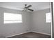 Well-lit bedroom featuring a ceiling fan at 2405 Falls River Dr, Lithia Springs, GA 30122