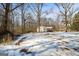 Side view of the house showing wooded area at 5552 Smithfield Rd, Bowdon, GA 30108