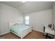 Bedroom featuring a single bed, white furniture, carpeted floors, natural light, and a desk at 5345 Bucknell Trce, Cumming, GA 30028
