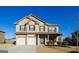 Charming two-story brick home with a well-manicured front yard and a two-car garage at 5345 Bucknell Trce, Cumming, GA 30028