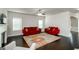 Bright living room featuring hardwood floors, recessed lighting, and contemporary decor with red sofas at 5345 Bucknell Trce, Cumming, GA 30028