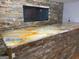 Basement bar with a unique epoxy countertop and stone backsplash at 793 Pixley Dr, Riverdale, GA 30296