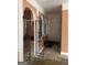 Unfinished basement with concrete floor and arched entryway at 793 Pixley Dr, Riverdale, GA 30296
