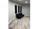 Basement studio with sound panels and a comfortable futon at 793 Pixley Dr, Riverdale, GA 30296