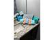 Clean bathroom with granite countertop and decorative towels at 793 Pixley Dr, Riverdale, GA 30296