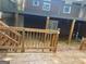 Deck and stairs providing backyard access and home views at 793 Pixley Dr, Riverdale, GA 30296