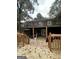 Large deck with stairs, offering backyard access and views at 793 Pixley Dr, Riverdale, GA 30296