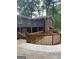Wrap-around deck showcasing backyard views and home exterior at 793 Pixley Dr, Riverdale, GA 30296