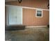 Covered patio area with double doors and a window at 793 Pixley Dr, Riverdale, GA 30296