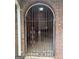 Ornate iron gate leading to a covered area at 793 Pixley Dr, Riverdale, GA 30296