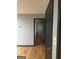 Bright hallway with hardwood floors and access to other rooms at 793 Pixley Dr, Riverdale, GA 30296