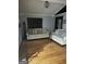 Living room with hardwood floors and neutral color scheme at 793 Pixley Dr, Riverdale, GA 30296