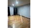 Spacious living room featuring hardwood floors and large windows at 793 Pixley Dr, Riverdale, GA 30296