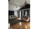 Spacious living room with two sofas and hardwood floors at 793 Pixley Dr, Riverdale, GA 30296