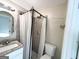 Clean basement bathroom with granite vanity and tiled shower at 3245 Bunny Ln, Decatur, GA 30034