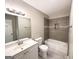 Updated bathroom with tile shower and a white vanity at 3245 Bunny Ln, Decatur, GA 30034